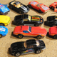 Corvettes, The Playart Vette has a broken rear bumper, the top left one has no rear bumper piece, and the Road Champs lost an A Pillar.